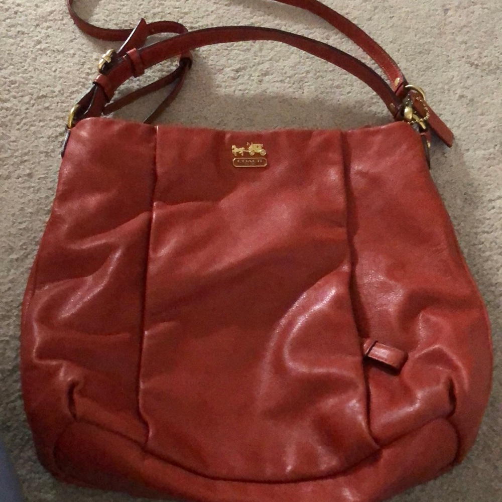 Coach bags.  One gray and one persimmon